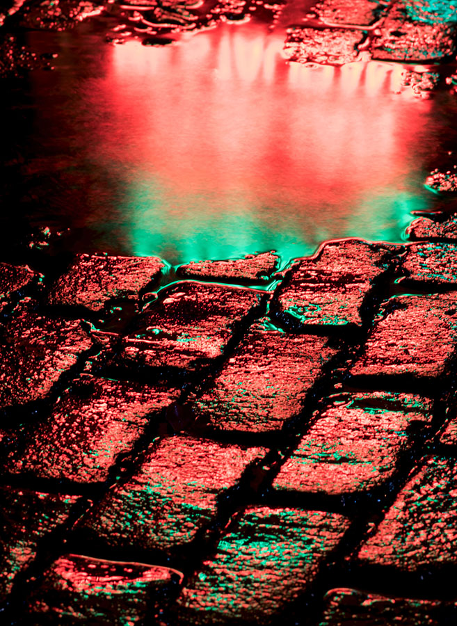 Neon reflection of Argieros restaurant in Ann Arbor's Kerrytown.